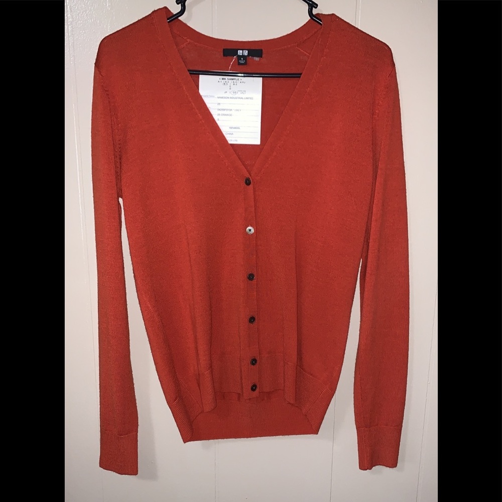 Rust/orange colored button up cover up